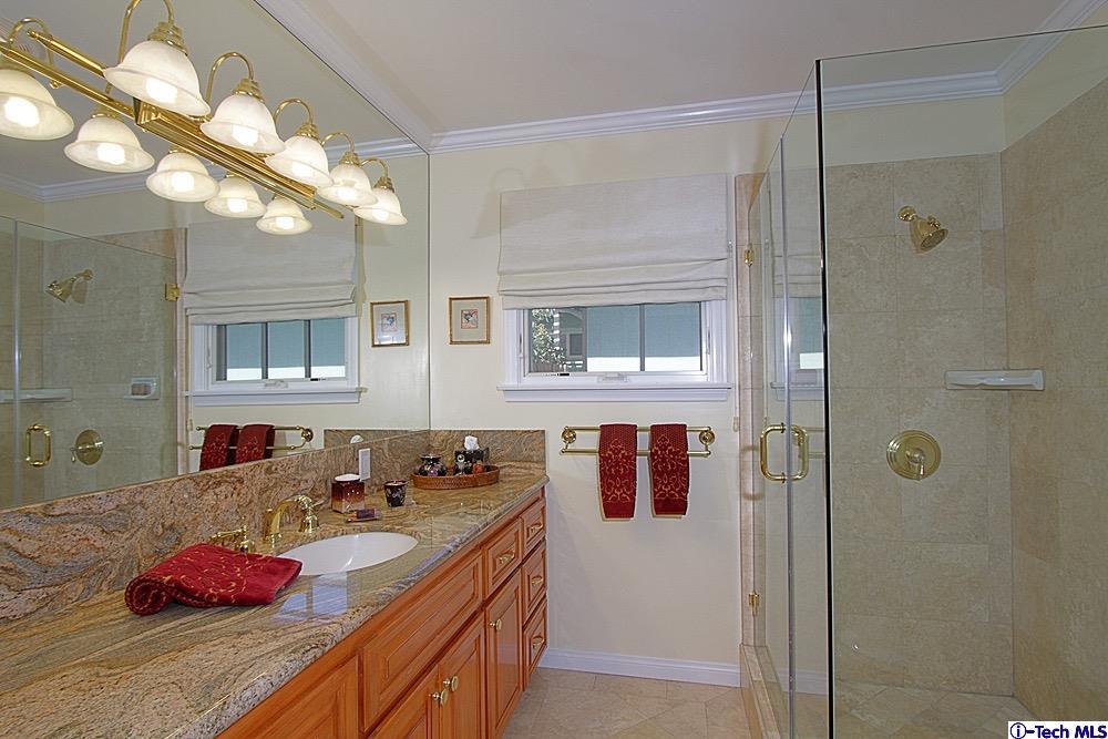 3690 Newhaven Road Pasadena, CA 91107 - Photo 18 of 21 a bathroom with a sink and a mirror