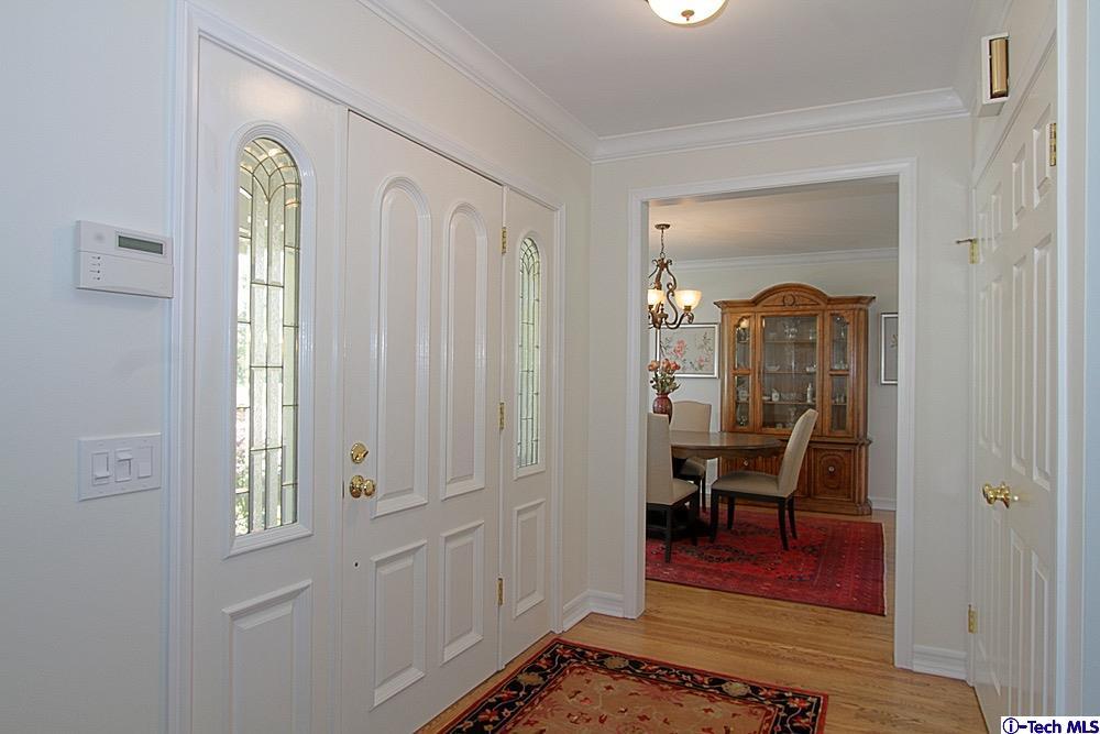 3690 Newhaven Road Pasadena, CA 91107 - Photo 3 of 21 a view of a bedroom with a bed and wooden floor