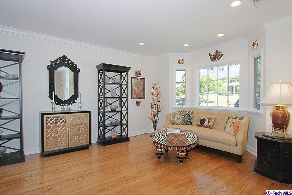 3690 Newhaven Road Pasadena, CA 91107 - Photo 7 of 21 a living room with furniture a window and wooden floor