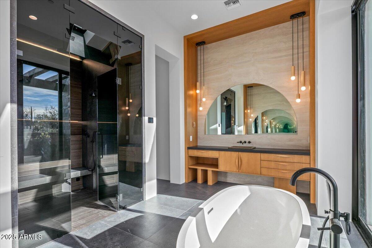 10249 East Joy Ranch Road Scottsdale, AZ 85262 - Photo 28 of 57 a living room with a couch and a potted plant