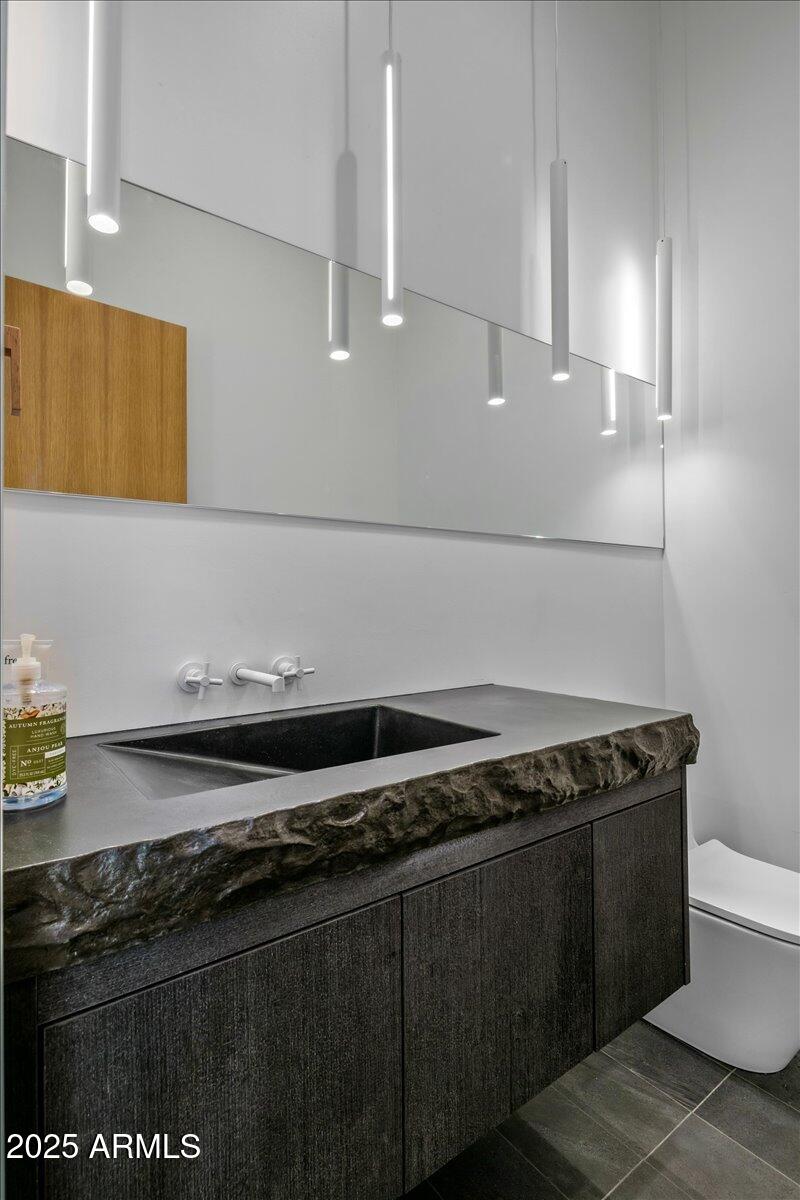 10249 East Joy Ranch Road Scottsdale, AZ 85262 - Photo 43 of 57 a close up of a stove top oven