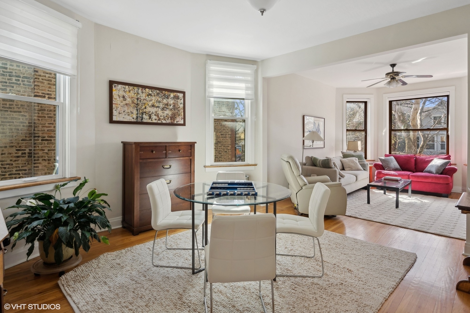 1920 West Addison Street Chicago, IL 60613 - Photo 19 of 34 a living room with furniture or couch and a potted plant