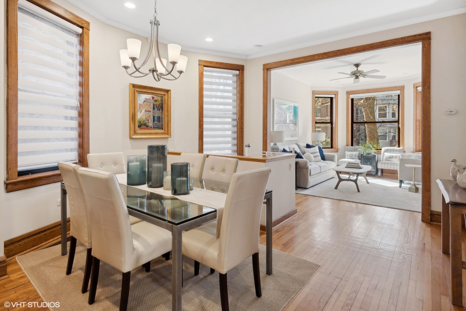 1920 West Addison Street Chicago, IL 60613 - Photo 5 of 34 a view of a dining room with furniture wooden floor and chandelier