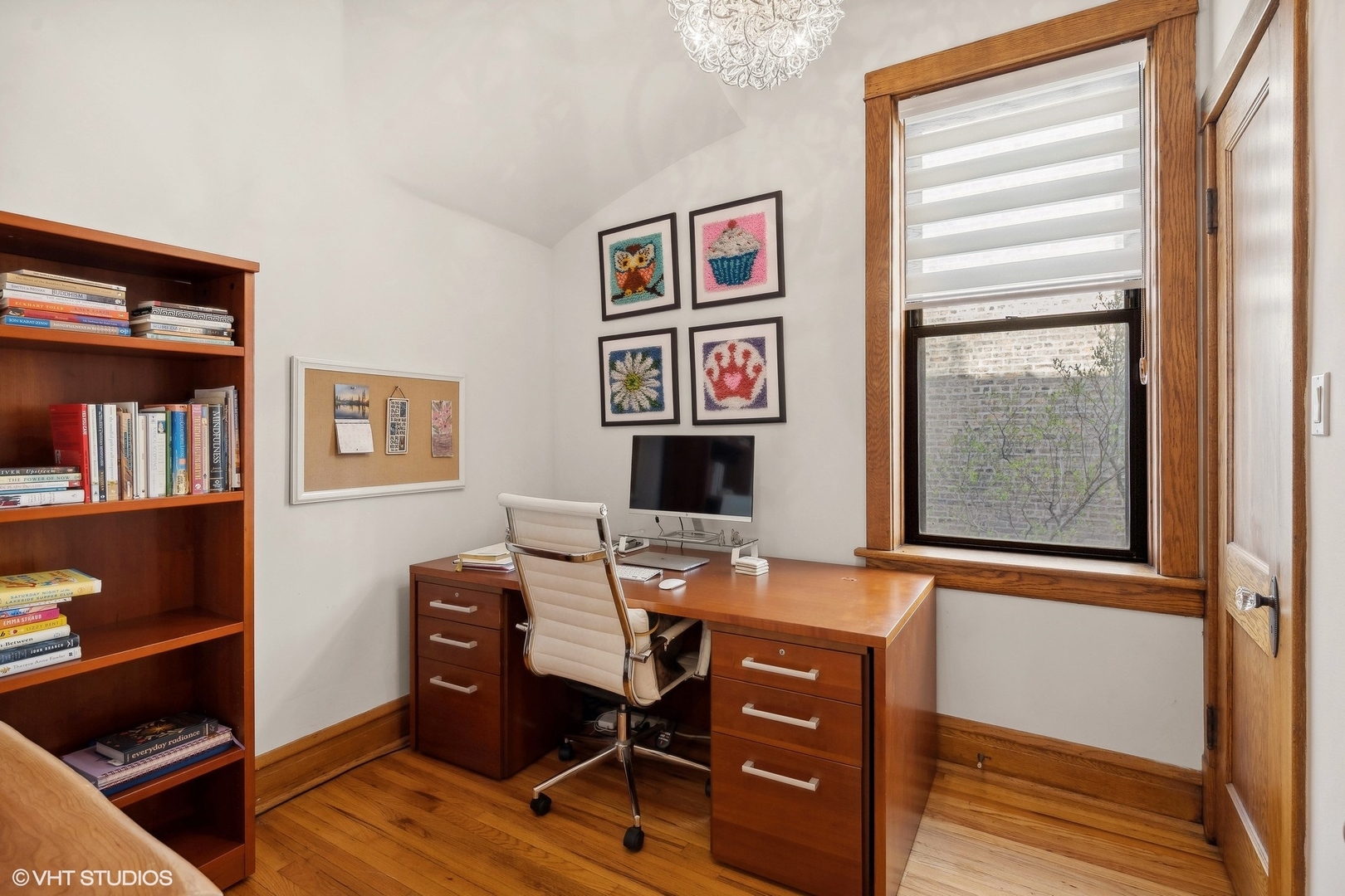 1920 West Addison Street Chicago, IL 60613 - Photo 7 of 34 a view of a workspace with furniture and a window