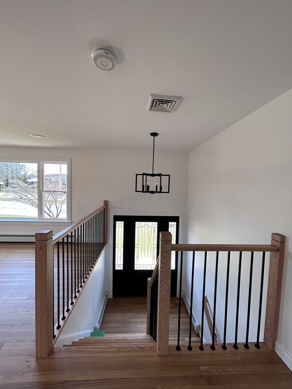 585 North Eastern Avenue Fall River, MA 02720 - Photo 20 of 26 a view of entryway bedroom and hall with wooden floor
