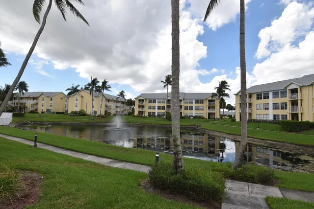 a view of a street with a building in the background