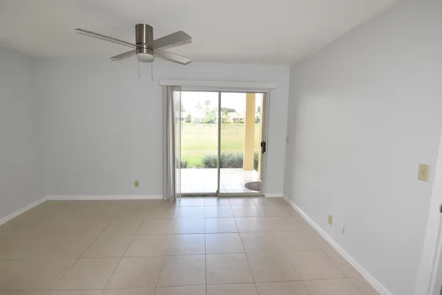 a bathroom with a toilet and shower