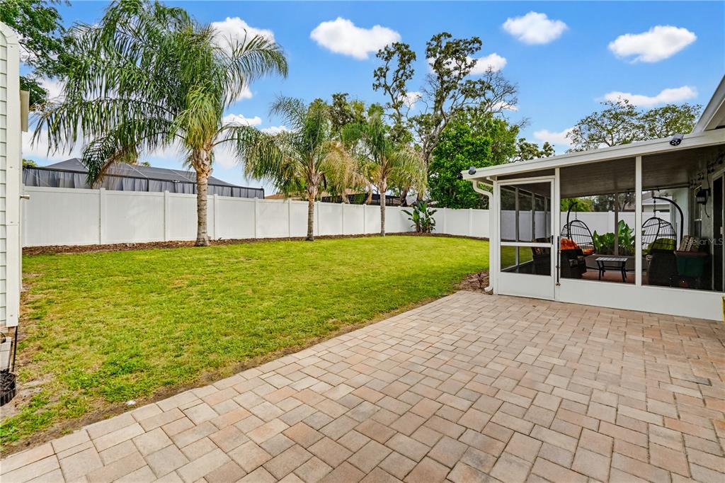 3497 Chadwick Avenue Spring Hill, FL 34609 - Photo 38 of 47 a view of a backyard with a garden and plants