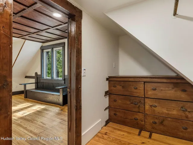a view of entry way with wooden floor