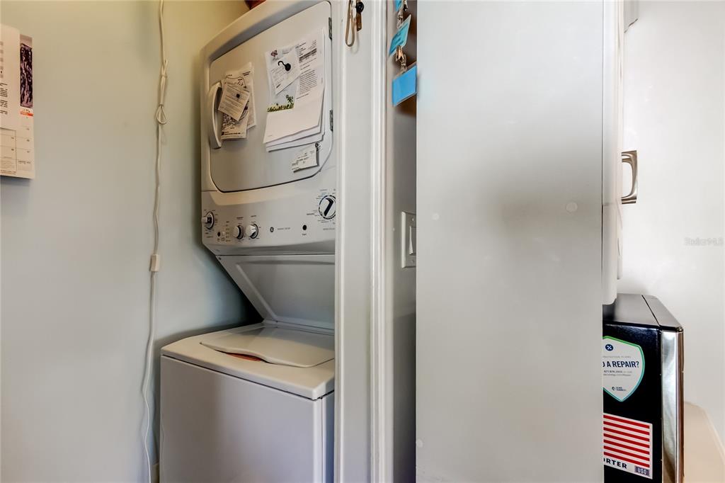 7 Frangipani Circle, Unit 7 Largo, FL 33770 - Photo 22 of 45 a utility room with dryer and washer