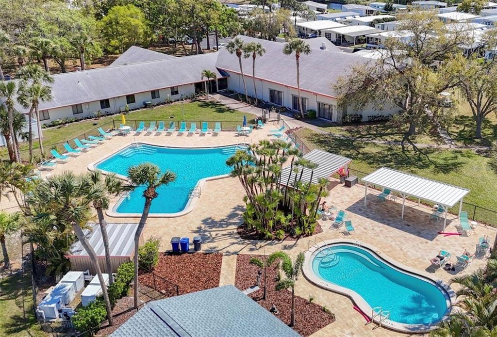 7 Frangipani Circle, Unit 7 Largo, FL 33770 - Photo 42 of 45 an aerial view of a house swimming pool and outdoor seating