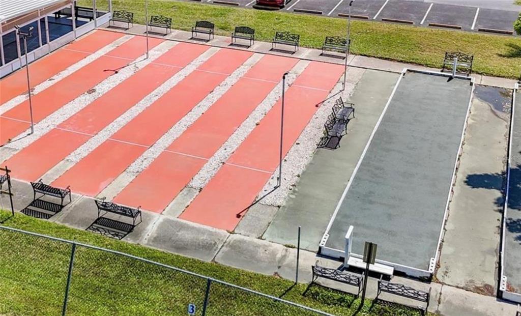 7 Frangipani Circle, Unit 7 Largo, FL 33770 - Photo 44 of 45 a view of a balcony with chairs