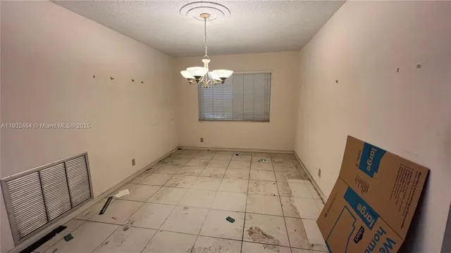 a view of a livingroom with a chandelier