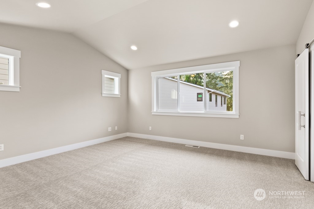 2422 242nd Place Southeast, Unit 12 Bothell, WA 98021 - Photo 10 of 25 a view of an empty room with a window
