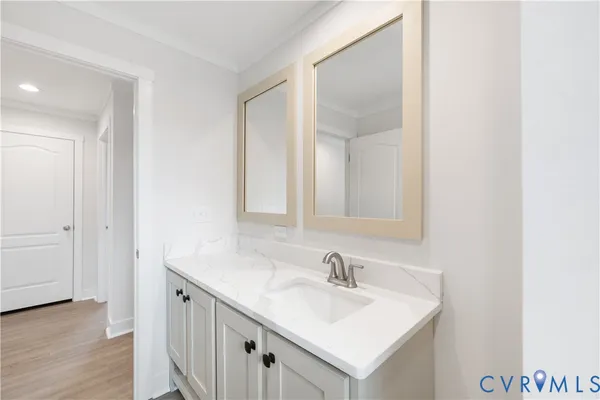 a view of bathroom with dual sinks