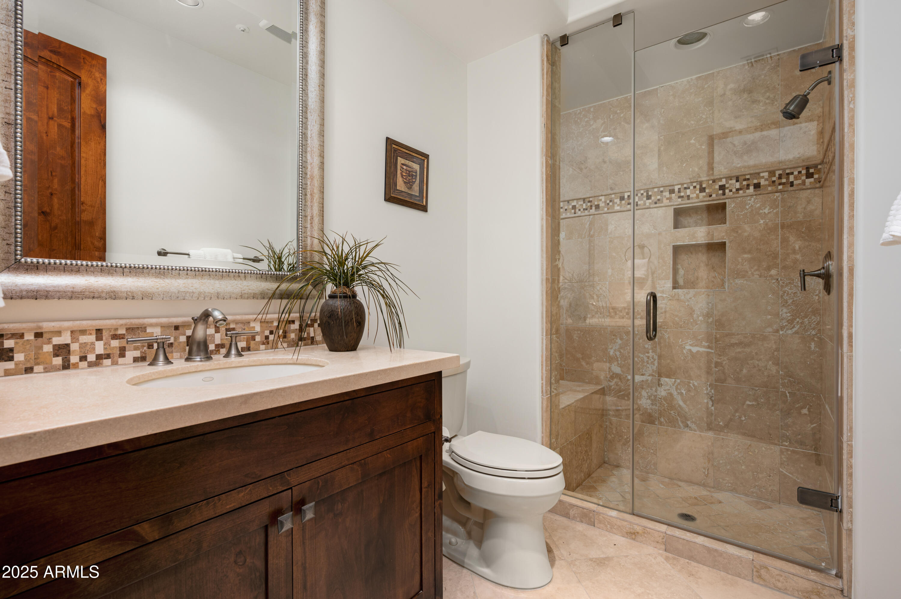 10597 East Rising Sun Drive Scottsdale, AZ 85262 - Photo 32 of 53 a bathroom with a sink a toilet and shower