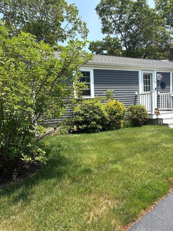 16 Hazelwood Road Dennis, MA 02660 - Photo 34 of 40 a front view of house with yard and green space