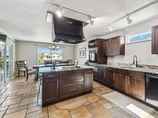 a bathroom with a sink toilet and a mirror