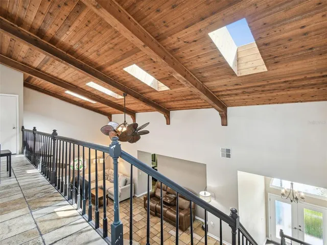 a view of a chairs and table in a backyard