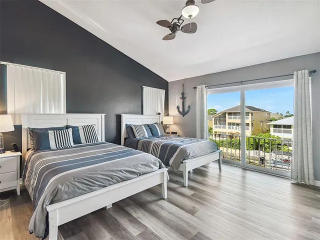 a view of a patio with swimming pool table and chairs