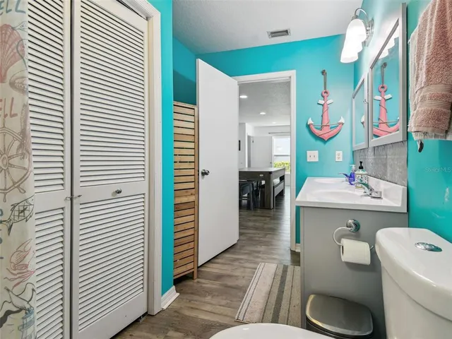 an aerial view of a house with a swimming pool