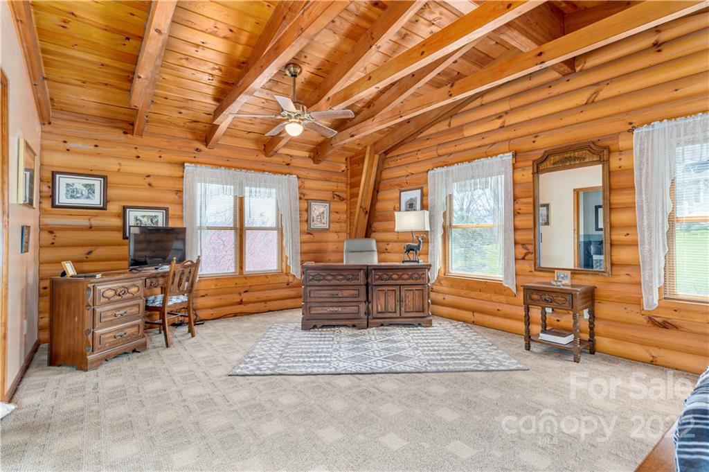 40 Yarrow Road Waynesville, NC 28785 - Photo 18 of 25 a living room with furniture and a dining table