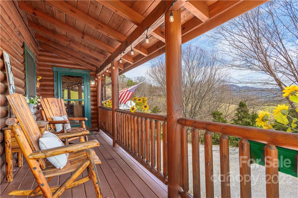 40 Yarrow Road Waynesville, NC 28785 - Photo 5 of 25 a view of deck with wooden floor and outdoor seating