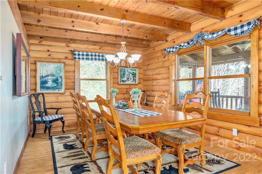 40 Yarrow Road Waynesville, NC 28785 - Photo 9 of 25 a view of a patio with a table and chairs