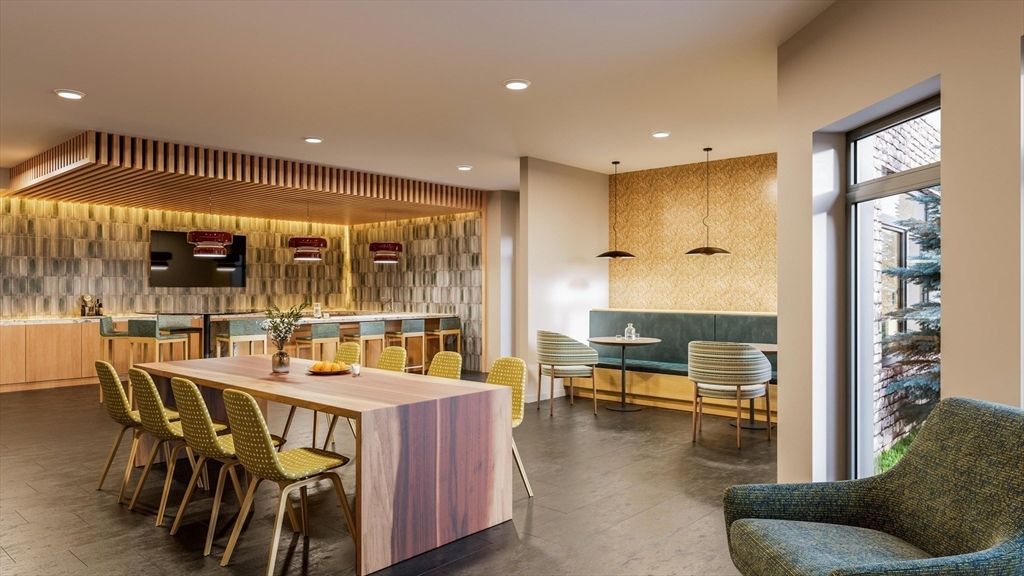 201 Sherman Road, Unit 515 Brookline, MA 02467 - Photo 5 of 26 a dining room with furniture and a floor to ceiling window