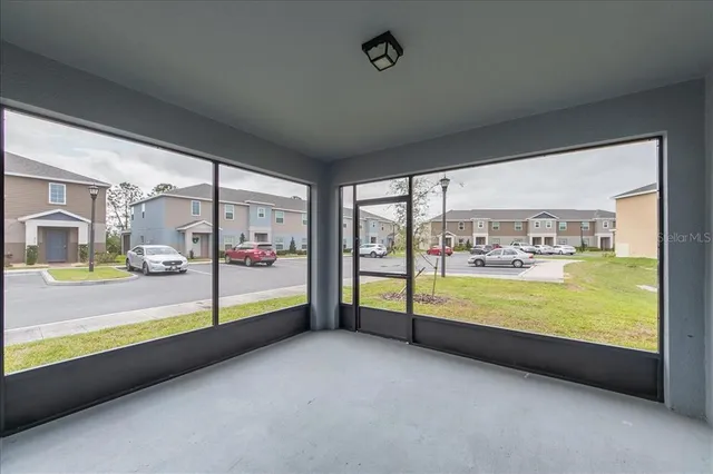 a view of an empty room with window