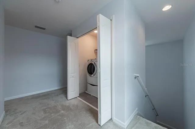 a bathroom with a shower and toilet