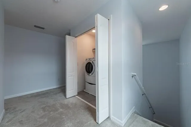a bathroom with a shower and toilet