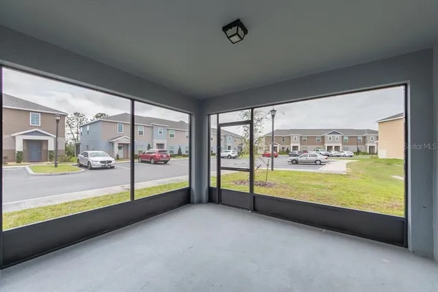 a view of an empty room with window