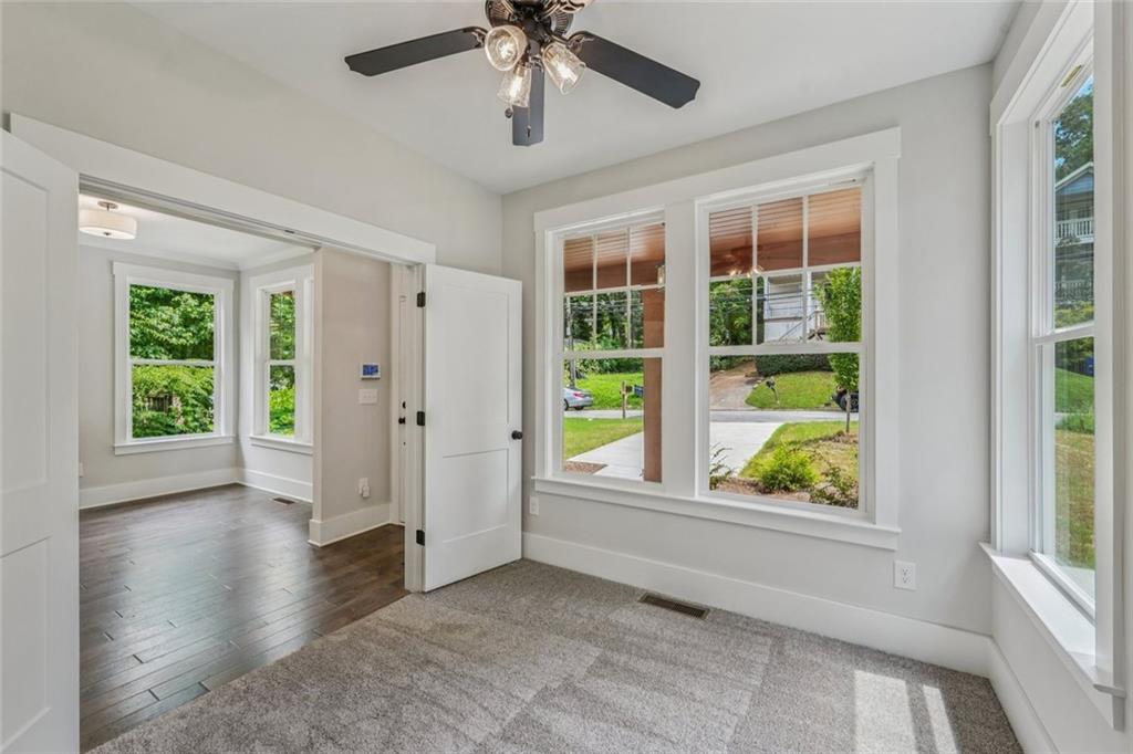 1179 Booker Avenue Southwest Atlanta, GA 30310 - Photo 23 of 54 an empty room with windows and entrance