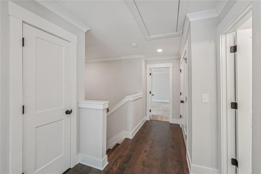 1179 Booker Avenue Southwest Atlanta, GA 30310 - Photo 35 of 54 a view of a hallway with a wooden floors