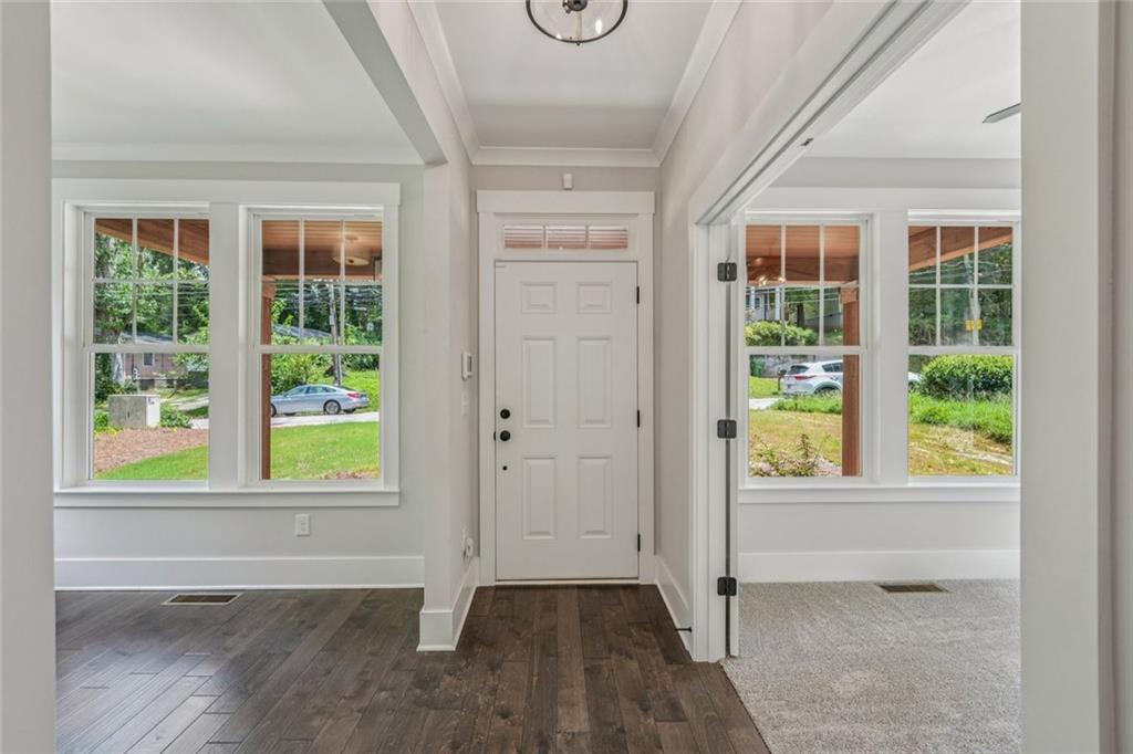 1179 Booker Avenue Southwest Atlanta, GA 30310 - Photo 42 of 54 a view of an entryway with wooden floor and door