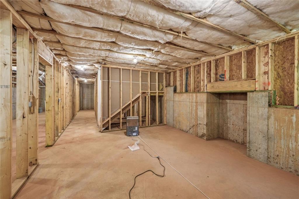 1179 Booker Avenue Southwest Atlanta, GA 30310 - Photo 43 of 54 a view of an empty room with wooden walls