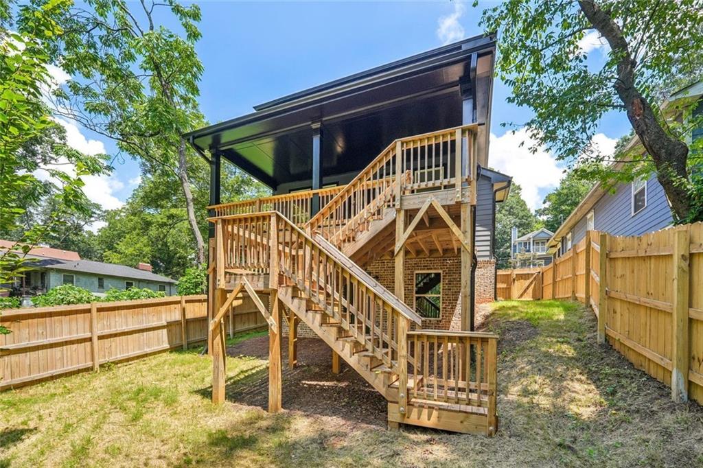 1179 Booker Avenue Southwest Atlanta, GA 30310 - Photo 49 of 54 a view of a house with a small yard