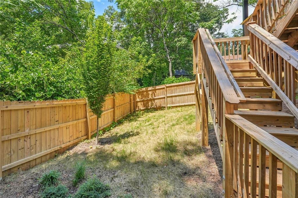 1179 Booker Avenue Southwest Atlanta, GA 30310 - Photo 50 of 54 a view of deck with wooden floor and fence