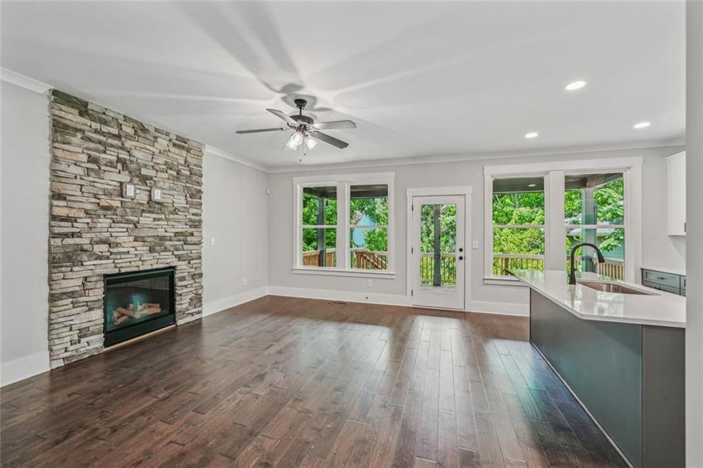 1179 Booker Avenue Southwest Atlanta, GA 30310 - Photo 9 of 54 a view of an empty room with wooden floor and a window
