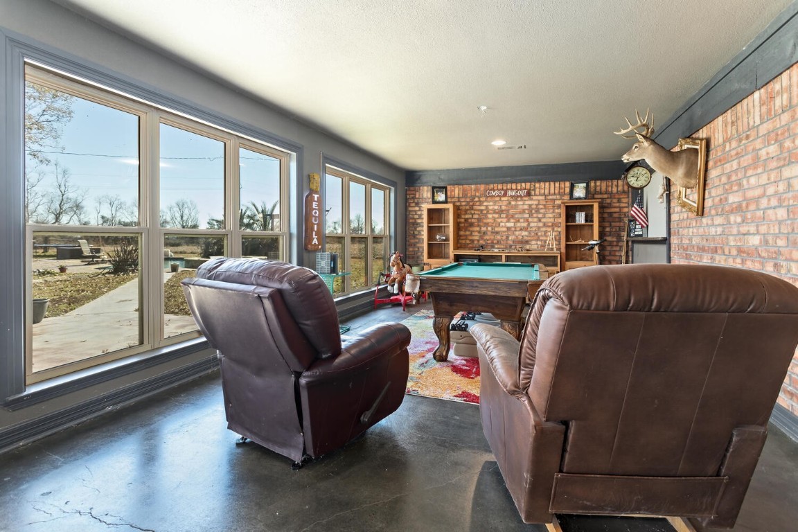 909 Turner Road Beaumont, TX 77713 - Photo 14 of 43 a living room with furniture and a large window