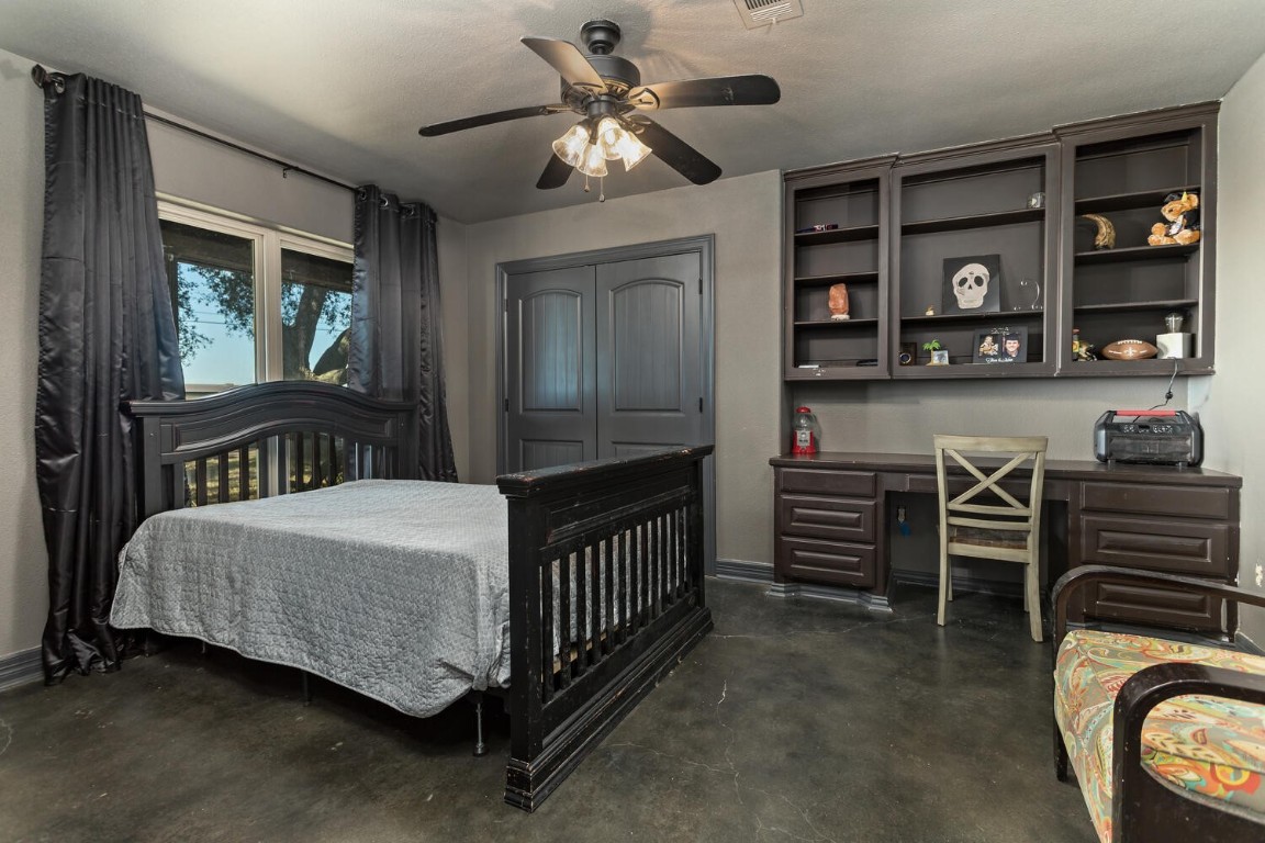 909 Turner Road Beaumont, TX 77713 - Photo 21 of 43 a bedroom with furniture and a baby crib