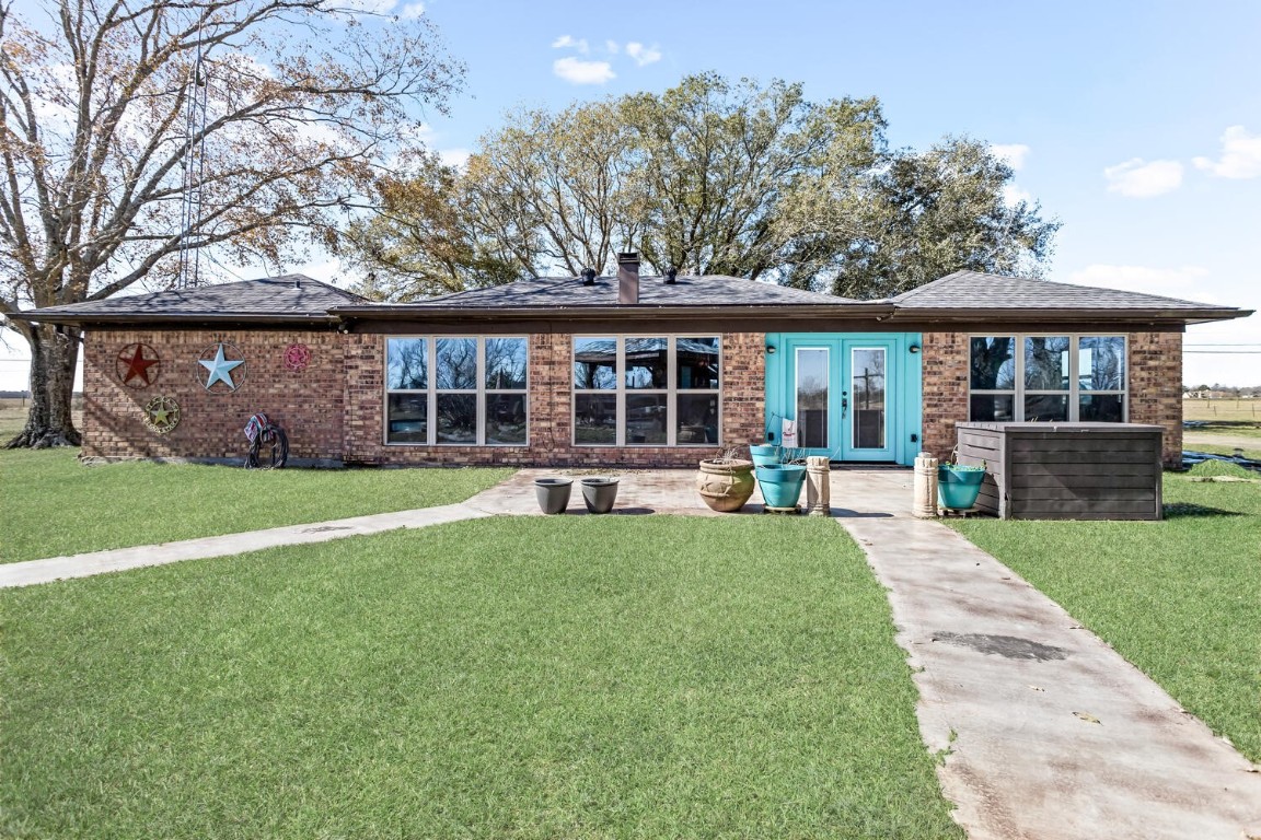909 Turner Road Beaumont, TX 77713 - Photo 29 of 43 a view of a house with backyard porch and sitting area