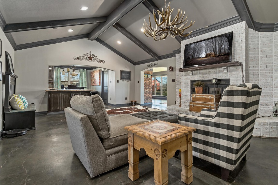 909 Turner Road Beaumont, TX 77713 - Photo 8 of 43 a living room with furniture and a fireplace