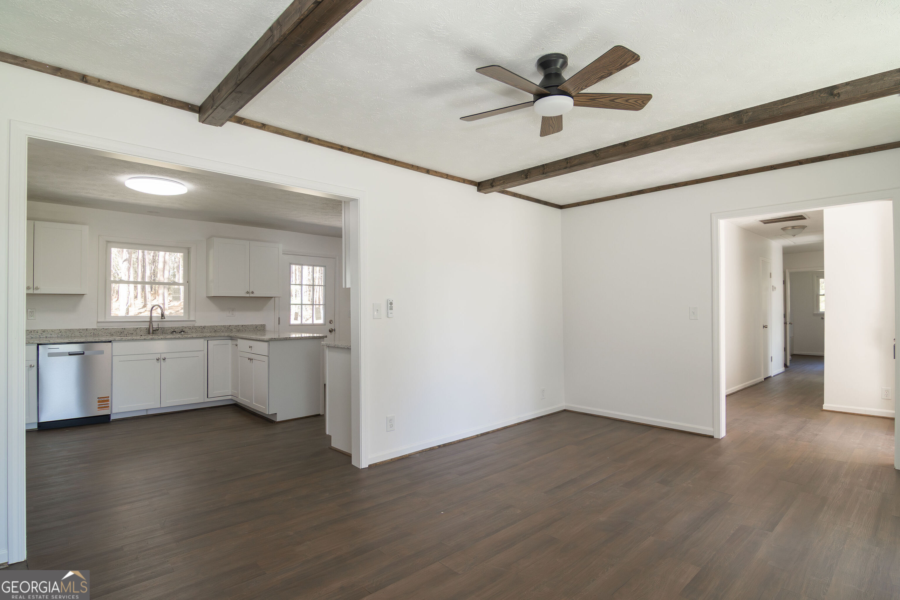331 Deerfield Road Hogansville, GA 30230 - Photo 11 of 62 a view of empty room with wooden floor and a ceiling fan