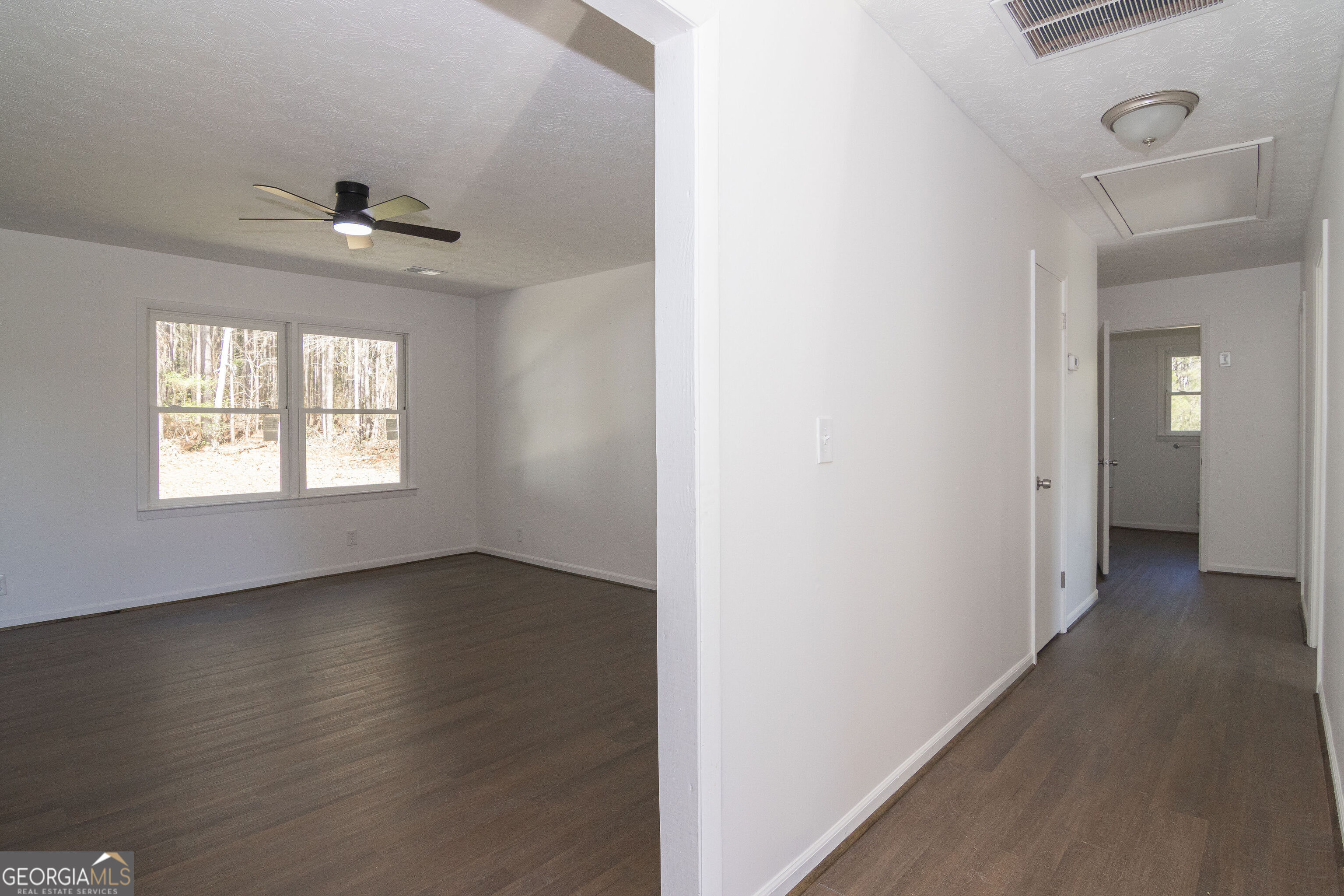 331 Deerfield Road Hogansville, GA 30230 - Photo 33 of 62 wooden floor in an empty room with a window