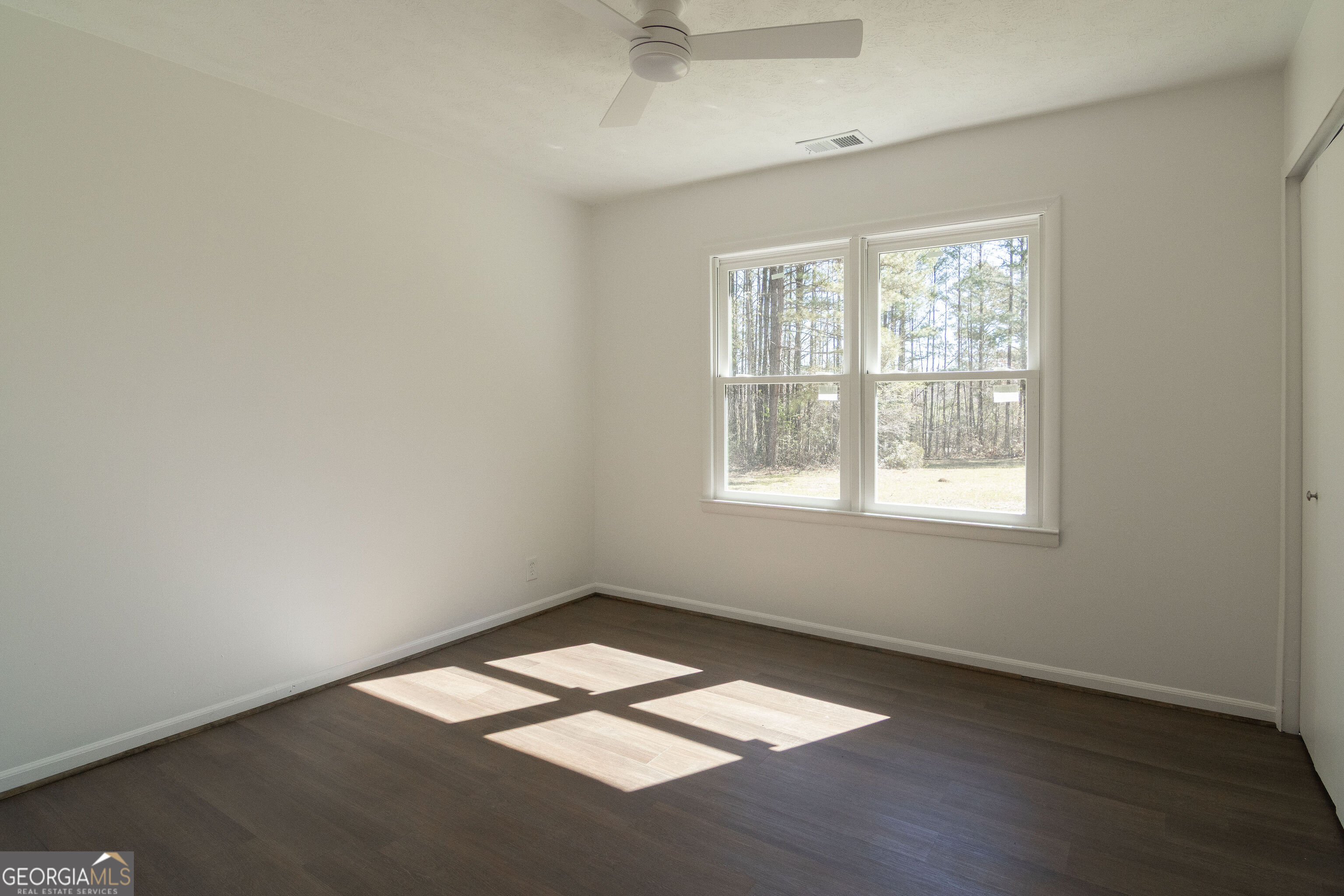 331 Deerfield Road Hogansville, GA 30230 - Photo 36 of 62 an empty room with a window