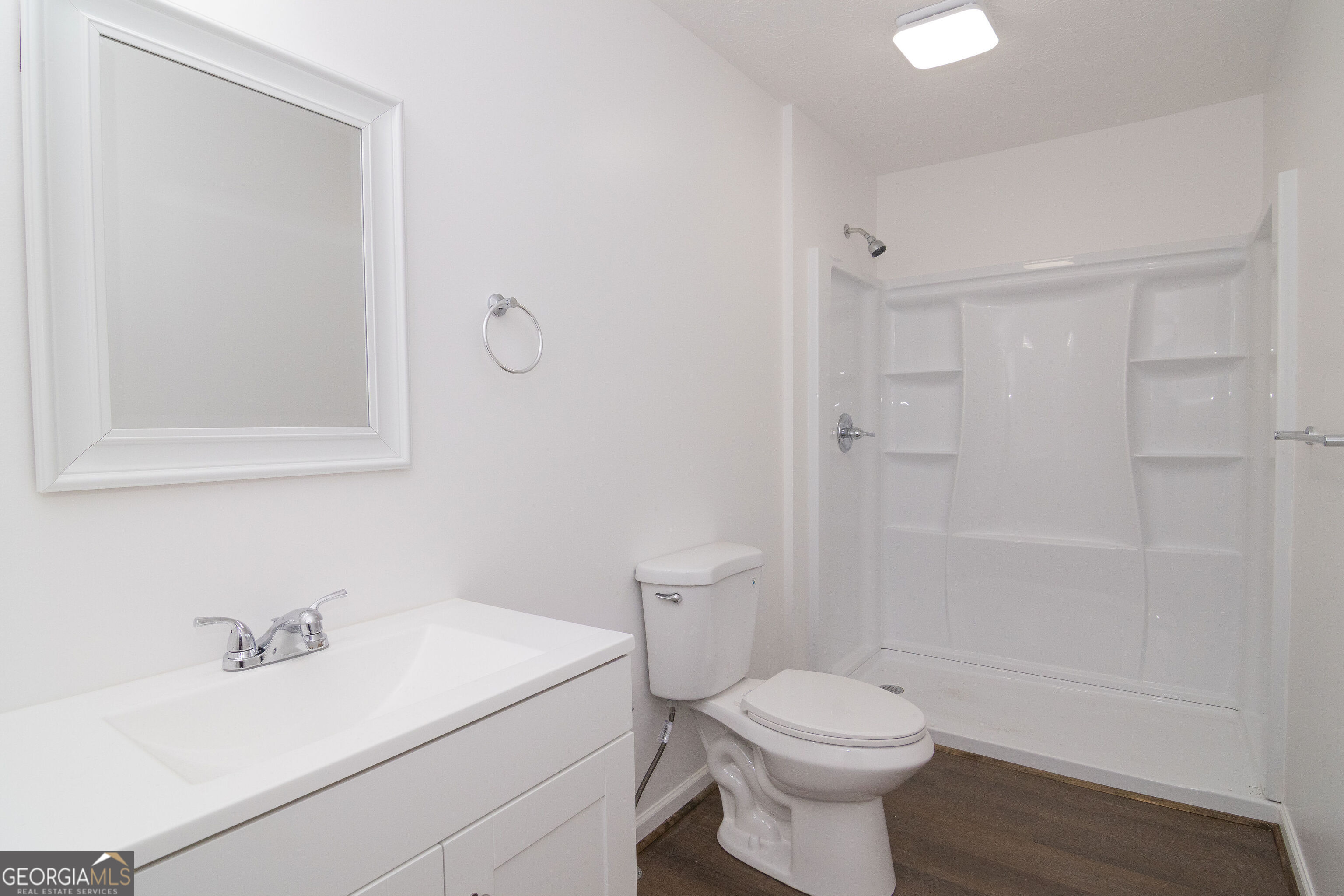 331 Deerfield Road Hogansville, GA 30230 - Photo 42 of 62 a bathroom with a sink a toilet and shower