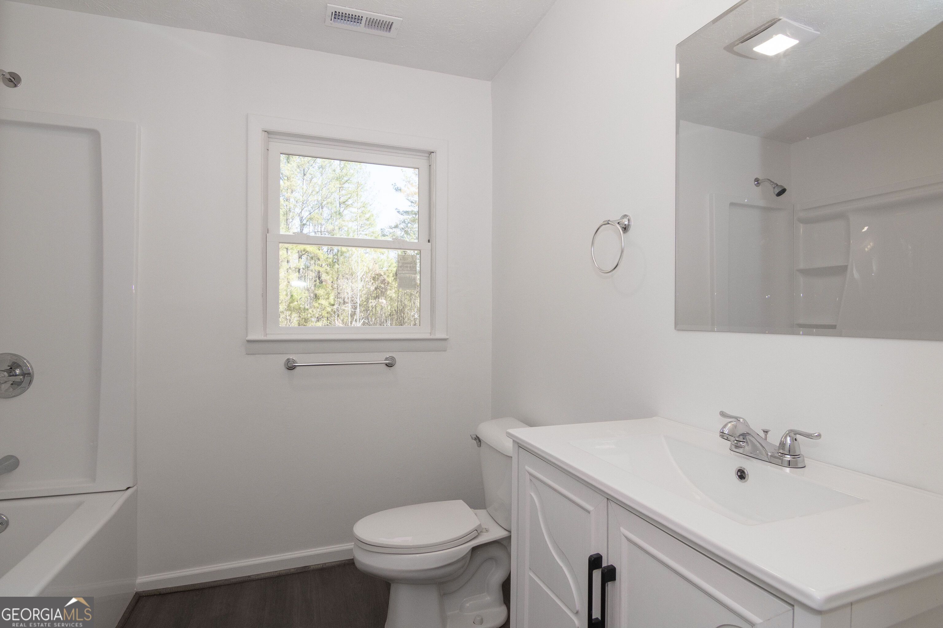 331 Deerfield Road Hogansville, GA 30230 - Photo 44 of 62 a bathroom with a sink toilet and vanity