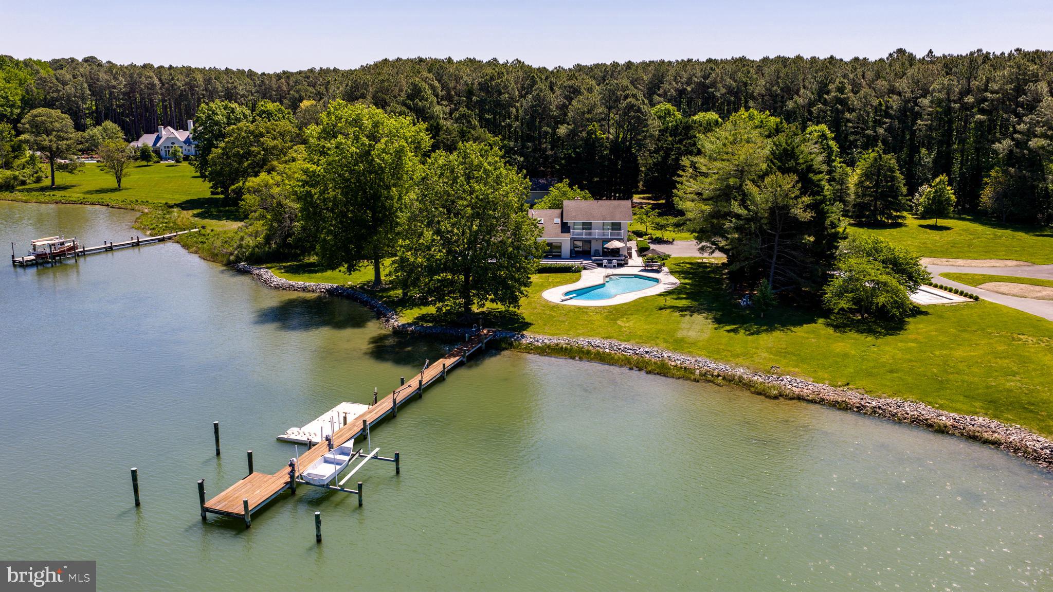 26282 Deep Water Harbor Road Easton, MD 21601 - Photo 37 of 53 a view of a lake with a mountain